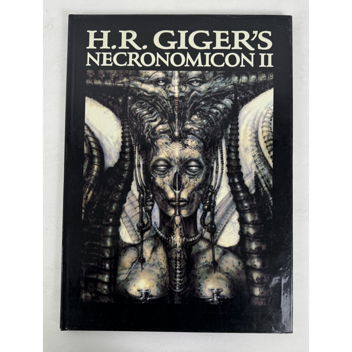 H.R. GIGER'S NECRONOMICON I, II, and Biomechanics